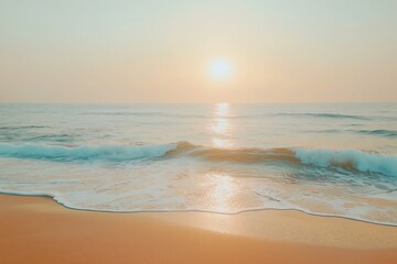 Golden hour view of the sun rising over a calm ocean with gentle waves washing onto a golden sandy beach

