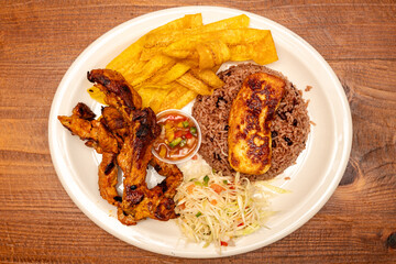 Pork with rice and plantain chips