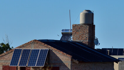 self-sustaining houses, water heaters and solar panels, ecology and sustainability