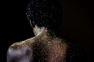 Abstract Backdrop: Golden Glitter Dusts on Dark Skin,  Illustrative Photography with Celestial Theme.
