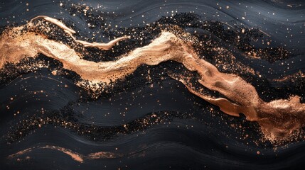 Abstract artwork featuring flowing metallic gold over a dark background
