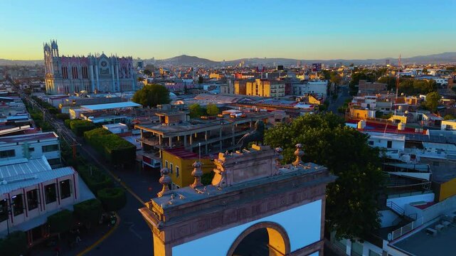 Aerial view of the Triumphal Arch of the Calzada de los Heroes at sunset, symbol of the city of Leon Guanajuato.