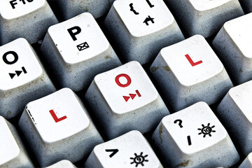 LOL keyboard keys. Dirty Keyboard with LOL written in red color