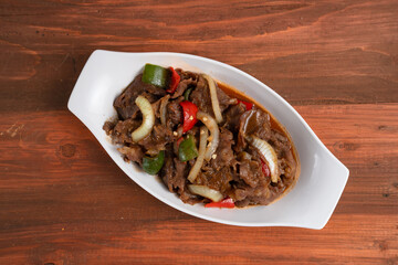 Asian Food: Teriyaki Beef with Onions and Peppers. Perfect for recipe, article, catalogue, or any commercial purposes. With copy space
