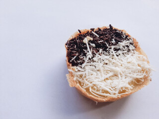 view of mini Martabak or moonlight on a white background. is a traditional Indonesian snack that has a soft texture with a buttery and sweet taste.