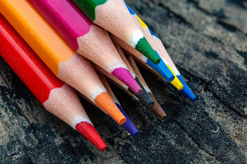 Close-Up of Colorful Pencils with Dusty Texture. Multicolored Pencils in close up Macro View