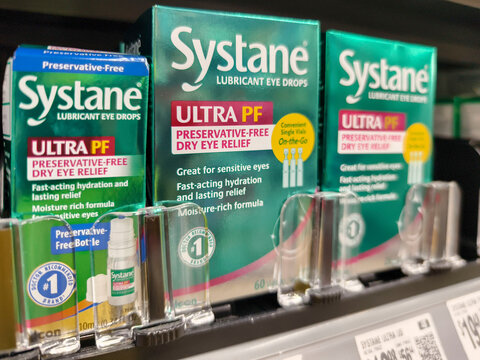 Display of Systane Lubricant Eye Drops on a Shelf in a Supermarket