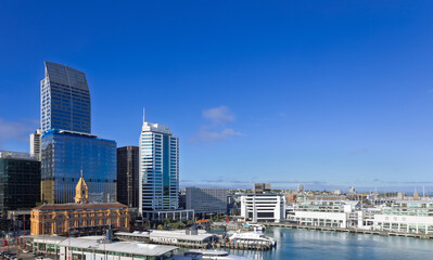 Scenic panoramic views of Auckland skyline and financial downtown city center.