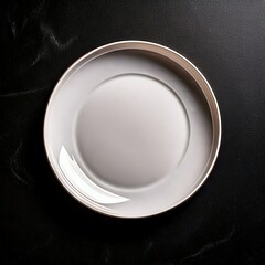 empty white plate on black background