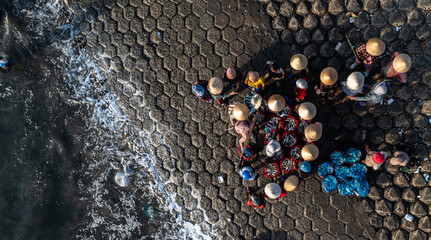 Dawn at Phuoc The fishing port, Binh Thuan, when the fishing boats return to the wharf, the fishing boats dock and the fish market begins to bustle	
