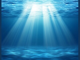 Sunlight streams through the clear blue water to the ocean floor