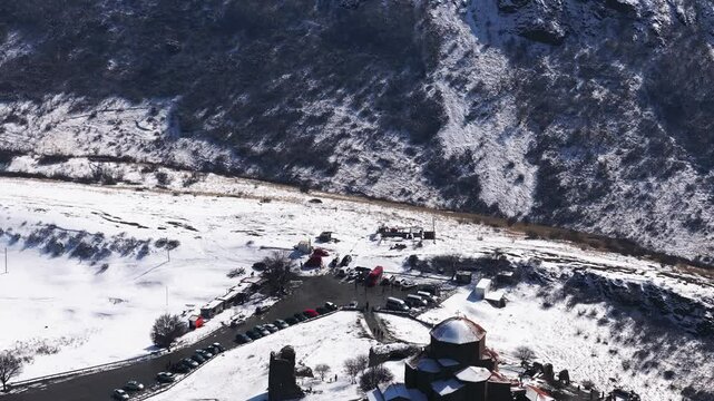 Aerial footage of the Jvari monastery, VI century, UNESCO Heritage. Drone flight over Jvari Monastery near Mtskheta, Georgia, on a sunny day, with beautiful views during daytime.