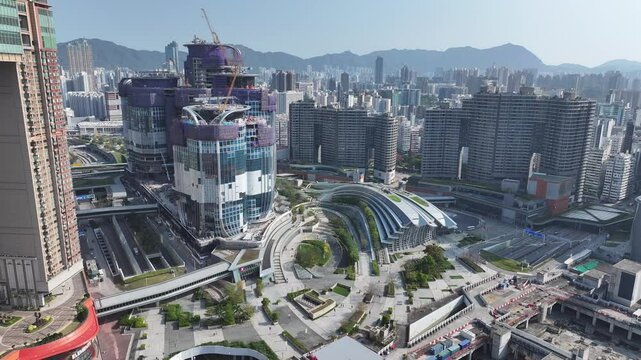 Aerial skyview of West Kowloon Cultural District iHong Kong, a world class arts and cultural hub with Palace Museum performance venues green spaces waterfront promenade near High speed railway Station