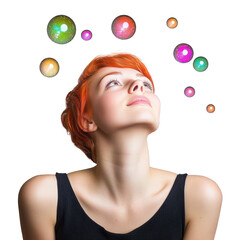 Naklejka premium woman with red hair looking up at colorful bubbles on transparent background