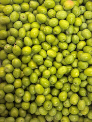 fresh green olives healthy food background