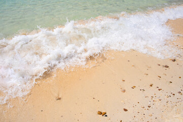 nature of the beach and sea Summer with sunshine, sandy beaches, clear blue waters sparkling against the blue sky. On an island with good ecology and environment Background for summer vacation