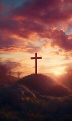 Symbol of faith a cross stands tall atop a hill bathed in the colors of dawn's early light