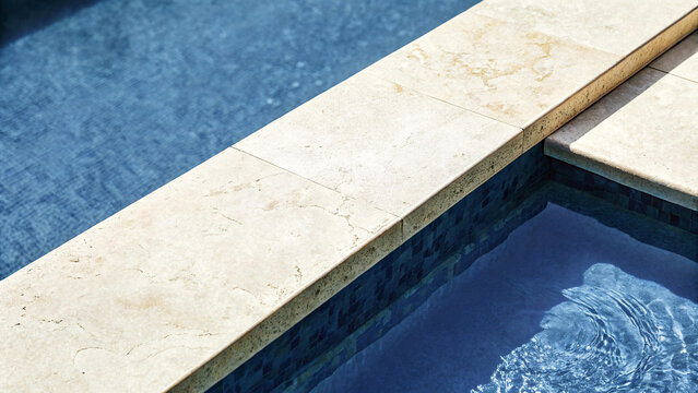 Luxurious Travertine Pool Coping with Blue Mosaic Tile Water Reflection