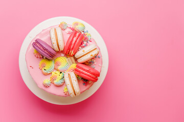 A beautifully decorated cake adorned with colorful macaronsoccasions
