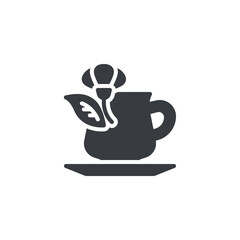 A tea cup with leaves and flowers vector icon