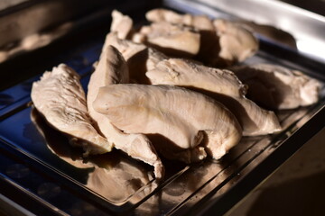 Boiled Chicken Breast, top view boiled chicken breast pieces, Pieces of boiled chicken breast...