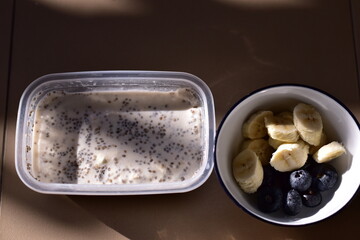 a healthy breakfast of overnight oats with milk, A bowl of overnight oats