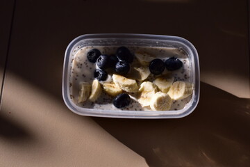 a healthy breakfast of overnight oats with milk, A bowl of overnight oats