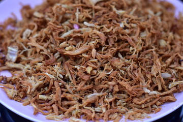 Serunding, dried meat floss made of beef or chicken, shredded chicken