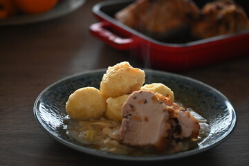 Traditional Czech Roast Pork with Sauerkraut and Potato Dumplings