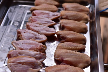 delicious crispy chicken wings arranged, Fried chicken wings in frying pan, Crispy Fried Chicken with Fish Sauce
