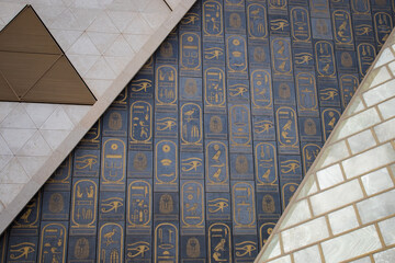 Ancient egyptian hieroglyphs on the main building of Grand Egyptian Museum