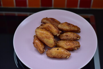 delicious crispy chicken wings arranged, Fried chicken wings in frying pan, Crispy Fried Chicken with Fish Sauce