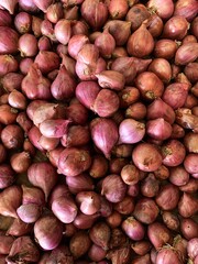 A bunch of fresh red onions. top view.