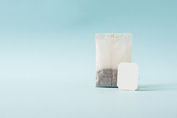Top view of tea bag on blue background