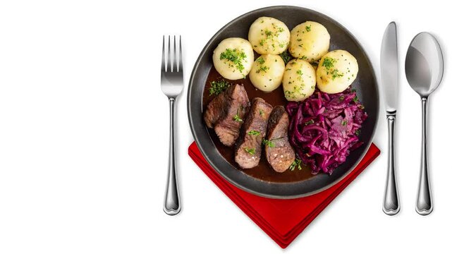 Traditional German Sauerbraten with Braised Red Cabbage  - looped 4к video