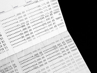 Obraz premium Bank account book statement balance number cash, hand holding data investment debt math in office, bill receipt and payment business credit card account, check paper financial loan tax concept.