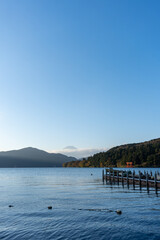 Mt. Fuji and red Torii gate on lake Ashi at Sunset, Hakone, Japan