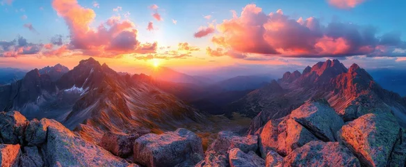 Tableau sur toile Coucher de soleil Scenic mountain panorama with sunlit clouds at sunrise or sunset  © STAR AI
