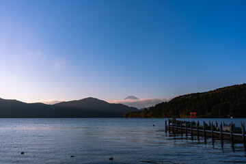 Mt. Fuji and red Torii gate on lake Ashi at Sunset, Hakone, Japan
