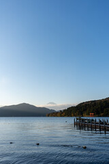 Mt. Fuji and red Torii gate on lake Ashi at Sunset, Hakone, Japan