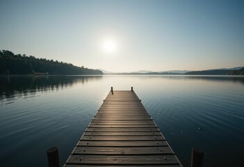 Obraz premium Tranquil Dock Overlooking Calm Water at Sunrise in Nature's Beauty