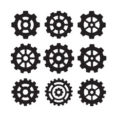 A medium shot of a collection of black gear and cogwheel icons arranged in a grid format. 
