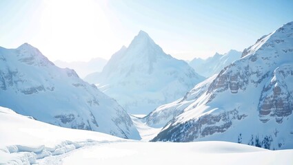 Obraz premium Capture the serene and majestic beauty of a snow-capped mountain landscape, with towering peaks glistening under a soft winter sun.