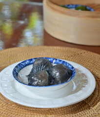 Black chinese Ha kao (dim sum) close up shot