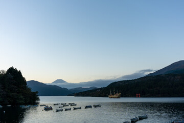 Mt. Fuji and small boats on lake Ashi at Sunset, Hakone, Japan