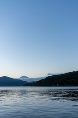 Mt. Fuji and red Torii gate on lake Ashi at Sunset, Hakone, Japan