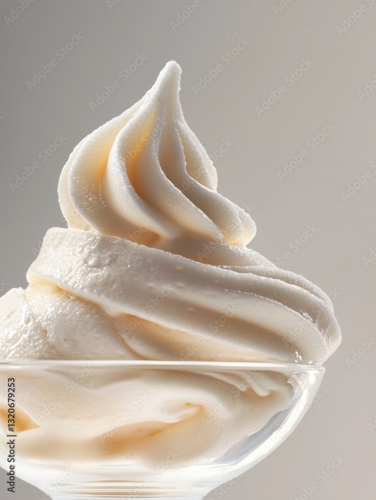 Aufkleber close-up of a scoop of vanilla ice cream in a glass bowl. the ice cream is a light beige color and h