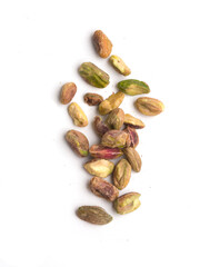 peeled pistachio nuts on white background
