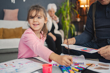 Creative moments of a young artist at home with family