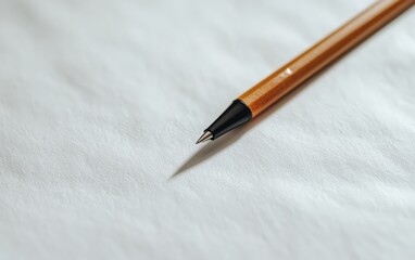 Brown Wooden Pen on White Textured Surface